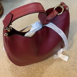 Coach Nomad hobo handbag